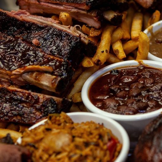 Big Ts BBQ plate of food with ribs, fries and gravy