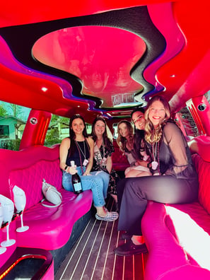 Pink limo rental birthday celebration